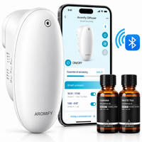 Aromify Smart Plug-In II with the Aromify Bluetooth app and Cabana and White Tea fragrance oils